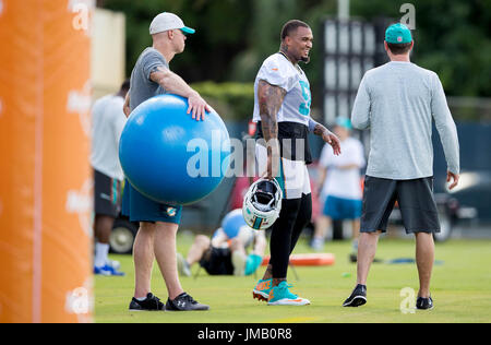 Davie, Florida, USA. 27th July, 2017. Miami Dolphins head coach Adam Gase talks with Miami Dolphins center Mike Pouncey (51) at Baptist Health Training Facility at Nova Southeastern University in Davie, Florida on July 27, 2017. Credit: Allen Eyestone/The Palm Beach Post/ZUMA Wire/Alamy Live News Stock Photo