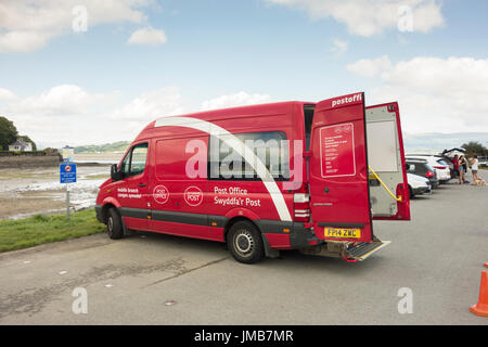 A mobile post office van visiting a rural Borth Y Gest in Wales Stock Photo