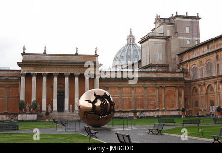 Golden Ball sculpture in courtyard of Vatican Museum. Rome, Italy Stock Photo