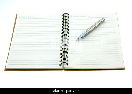 Notebook and pen on a white background Stock Photo