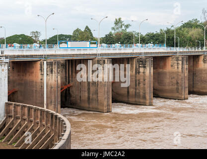 Flood gate of the small concrete dam on the river for use to the irrigation in the countryside area,Thailand. Stock Photo
