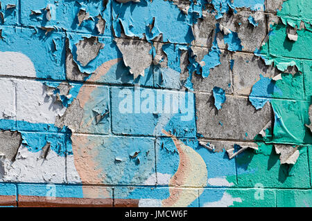 Peeling paint on a brick wall Stock Photo