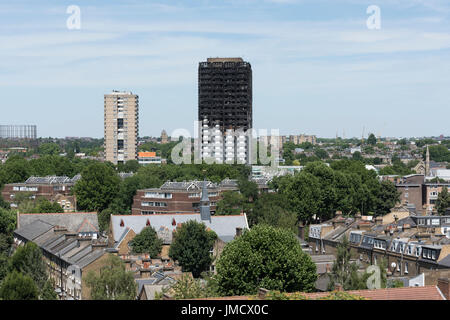 The charred remains of Grenfell Tower, Notting Hill, London, Britain. The 24 storey residential Tower block was engulfed in flames in the early hours  Stock Photo