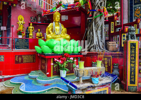 HONG KONG, MAY 31: Buddha statue in Kwun Yam Shrine temple, a Taoist shrine at the southeastern end of Repulse Bay, Hong Kong Stock Photo