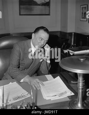 J. Edgar Hoover, Director of FBI, Department of Justice, Portrait on Telephone, Washington DC, USA, Harris & Ewing, April 1940 Stock Photo