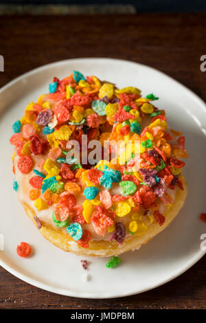 Homemade Gourmet Donuts with Cereal on Top for Breakfast Stock Photo