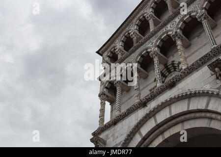 Italy, Lucca - September 18 2016: detail exterior view of the fragment of Lucca Cathedral. Cattedrale di San Martino on September 18 2016 in Lucca, Tu Stock Photo