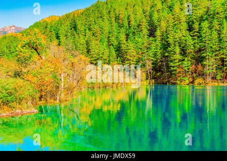 View of Panda lake at autumn sunset time. Stock Photo