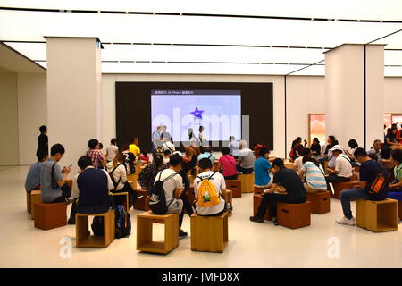 A lecture teaching about the Apple operating system at the grand opening of the 1st Apple headquarters located in Taipei 101 building, Taipei, Taiwan. Stock Photo