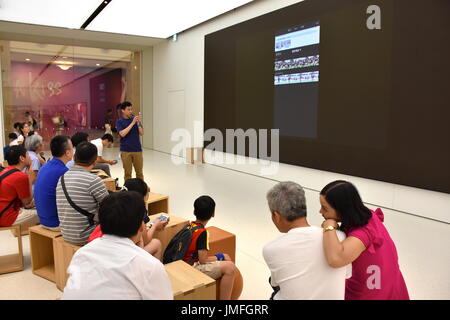 A lecture about Apple OS and its uses at the grand opening of the 1st Apple headquarters located in Taipei 101 building, Taipei, Taiwan. Stock Photo