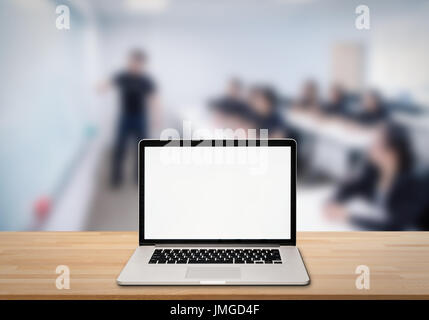 computer notebook with blank screen on wooden table Stock Photo