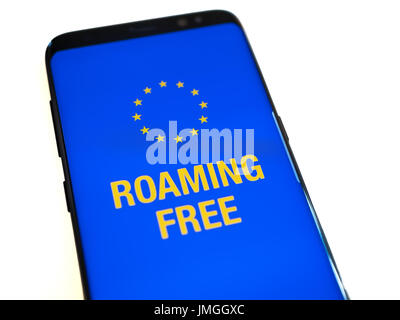 No roaming cost in the EU zone. Mobile phone on white background. Close up view Stock Photo