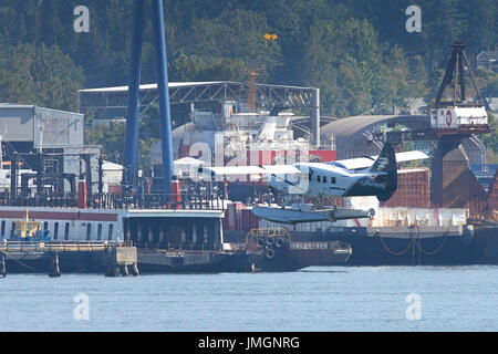 de Havilland Turbo Otter Taking Off From Vancouver Harbour, British Columbia, Canada. Stock Photo