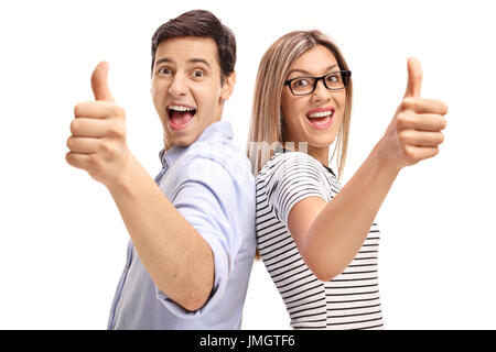 Young man and woman holding their thumbs up isolated on white background Stock Photo