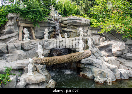 Snow White and The Seven Dwarfs waterfall garden in Hong Kong Disneyland Stock Photo