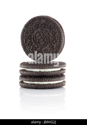Three Chocolate Biscuits Filled With Cream Isolated on White Background Stock Photo