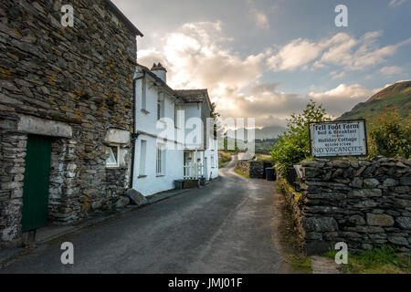 UK countryside scenery: rural Little Langdales farmhouse and b&b, English Lake District, Cumbria Stock Photo