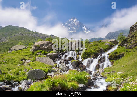 The first waterfalls of the great river Po' under the Monviso, Crissolo, Po' Valley, Cuneo District, Piedmont, Italy. Stock Photo