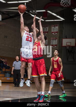 Basketball action with Chico vs. Foothill High School in Palo Cedro, California. Stock Photo