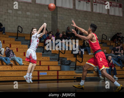 Basketball action with Chico vs. Foothill High School in Palo Cedro, California. Stock Photo