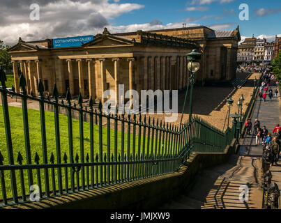 Looking down Playfair Steps and iron railings to Scottish National Gallery on The Mound, Edinburgh, Scotland, UK, with tourists in the Summer Stock Photo