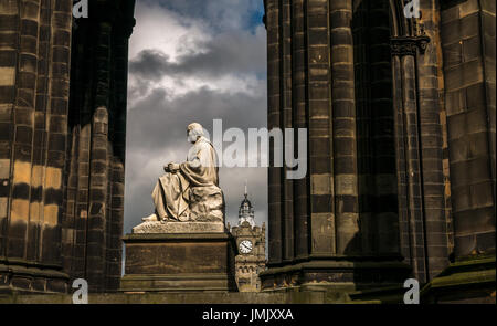 Scott monument, Princes Street, Edinburgh, Scotland, UK, by George Meikle Kemp, statue of Sir Walter Scott by John Steel and Balmoral Hotel clock Stock Photo