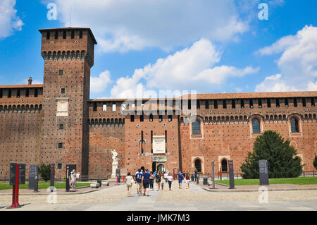 Milan, Italy - June 27, 2016: Tourists visit the XV century Sforza Castle (Castello Sforzesco) in Milan, Lombardy, Italy Stock Photo