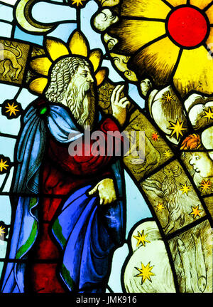 Close-up of colorful stained glass depicting religious scene in Milan, Italy Stock Photo