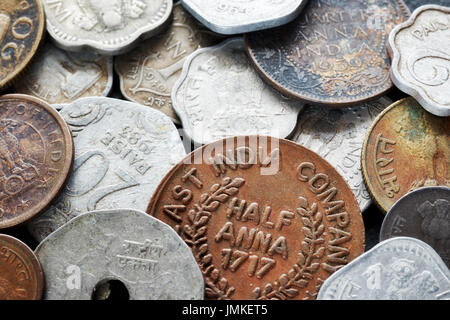 Extreme close up picture of old Indian rupee coins, shallow depth of field. Stock Photo