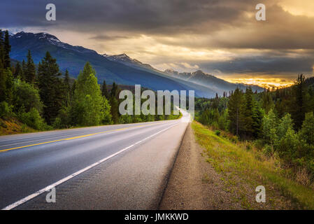 Scenic Icefields Pkwy in Banff National Park at sunset. It travels through Banff and Jasper National Parks and offers spectacular views. Stock Photo