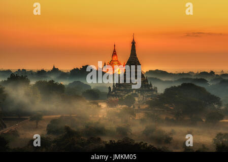 Scenic sunrise above Bagan in Myanmar. Bagan is an ancient city with thousands of historic buddhist temples and stupas.