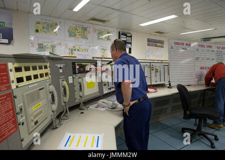 The OIM (offshore installation manger) making a public announcement, during a emergency drill. credit: LEE RAMSDEN / ALAMY Stock Photo