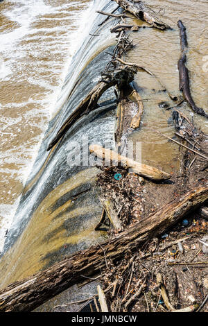 Small dam with running water fall in Accotink park in Fairfax, Virginia Stock Photo