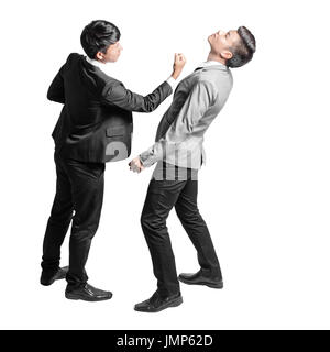 Portrait of an angry businessman is punching across the businessman's face. Isolated full body on white background Stock Photo