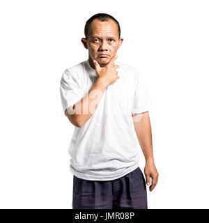 Portrait of an african man with Down syndrome is in an African village.  Stock Photo