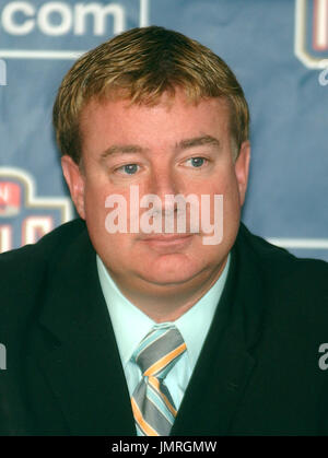 Washington Nationals General Manager Jim Bowden, right, holds up a jersey  during a news conference introducing Manny Acta as the baseball team's new  manager in Washington, Tuesday, Nov. 14, 2006. (AP Photo/Lawrence