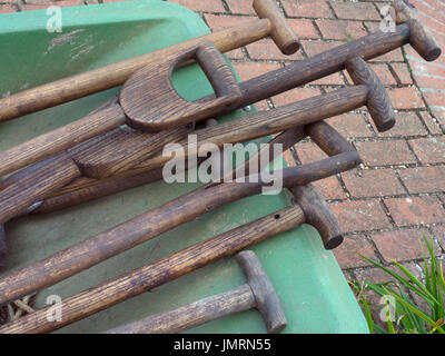 Garden tools in wheelbarrow Stock Photo