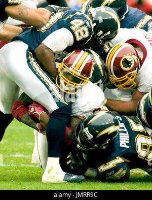 Houston Texans tight end Joel Dreessen (#85) runs past San Diego Chargers  safety Clinton Hart and into the endzone for a touchdown in the third  quarter at Qualcomm Stadium in San Diego