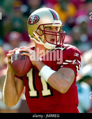 Quarterback Alex Smith of the San Francisco 49ers prepares to throw a