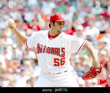 Washington Nationals pitcher Luis Ayala balances a baseball on his left  hand during the first full works out for pitchers and catchers at Space  Coast Stadium in Viera, Fla., Thursday, Feb. 15