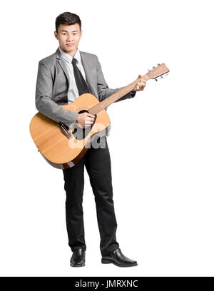 Portrait of a young business man with guitar. Isolated on white background with clipping path Stock Photo