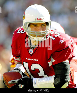 Arizona Cardinals quarterback Kurt Warner argues with a referee as