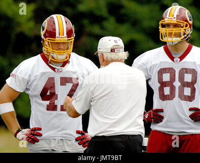 Washington Redskins cornerback David Amerson, right, covers tight end  Deangelo Peterson during a rookie minicamp practice session at Redskins  Park on Sunday, May 5, 2013, in Ashburn, Va. (AP Photo/Evan Vucci Stock