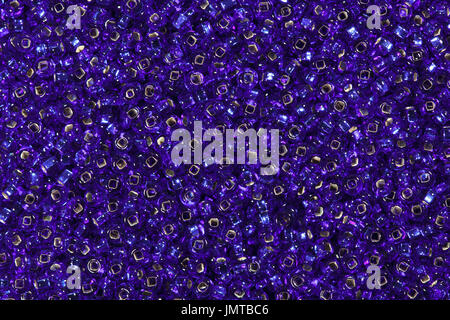 Background of light purple seed beads. Stock Photo
