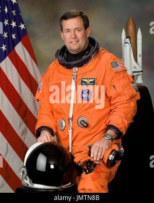 Astronaut Michael J Foreman Sts 123 Mission Specialist Attired In A Training Version Of His Extravehicular Mobility Unit Emu Spacesuit Awaits The Start Of A Training Session At The Neutral Buoyancy Laboratory Nbl