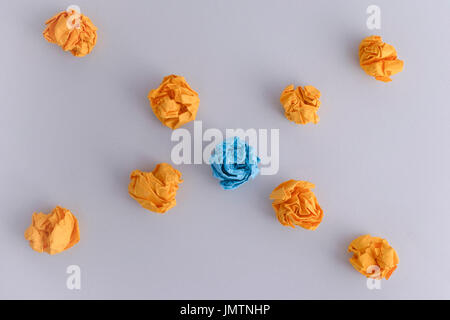 Crumpled paper balls on a grey background. Close up. Stock Photo