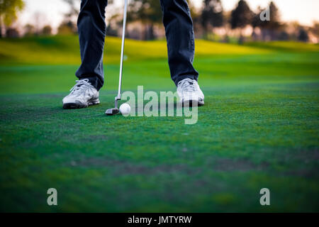 Golfer on the golf course Stock Photo