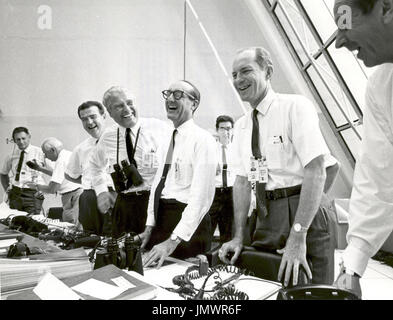 Cape Canaveral, FL - (FILE) -- Apollo 11 mission officials relax in the Launch Control Center following the successful Apollo 11 liftoff on Wednesday, July 16, 1969. From left to right are: Charles W. Mathews, Deputy Associate Administrator for Manned Space Flight; Dr. Wernher von Braun, Director of the Marshall Space Flight Center; George Mueller, Associate Administrator for the Office of Manned Space Flight; Lt. Gen. Samuel C. Phillips, Director of the Apollo Program.Credit: NASA via CNP