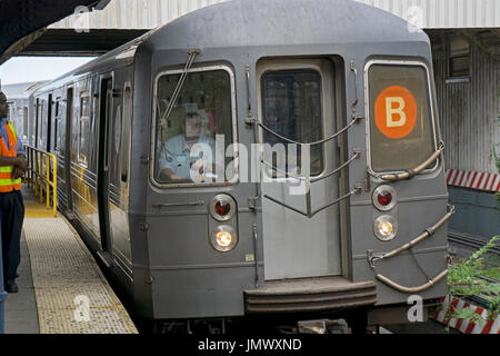 A B subway train pulling into the Brighton Beach station in Brooklyn, New York. Stock Photo