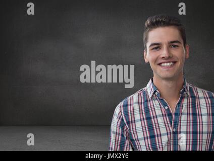 Digital composite of Man standing with blackboard Stock Photo